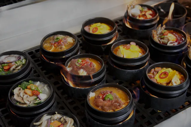 BCD Tofu House soon tofu stews in hot stone pots; official brand photograph shared across locations.