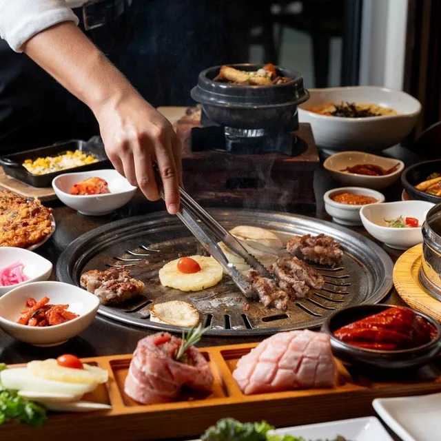 A BORI tabletop grill surrounded by Korean side dishes; official brand photograph, location not established.