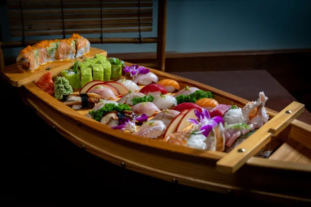 Midori’s Family Boat with sushi, sashimi and rolls.