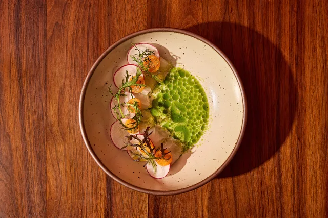 Uchi Houston madai crudo with sea bream and ground cherries.